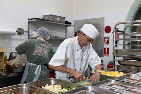 Lunch being prepared in kitchen of Loaves and Fishes. 