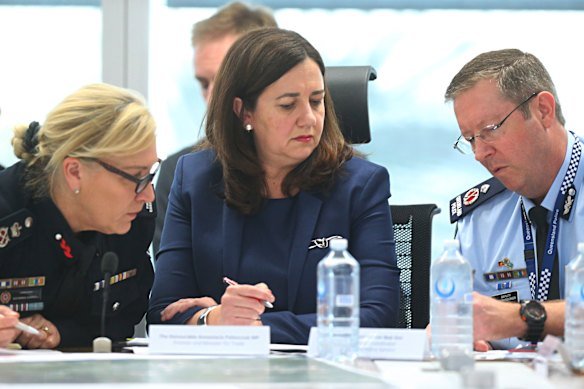 Bob Gee, then in the role of State Disaster Coordinator, alongside former premier Annastacia Palaszczuk and former Police Commissioner Katarina Carroll.