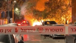Fiery aftermath of Iran missile strike near Tel Aviv caught on video after 2 killed