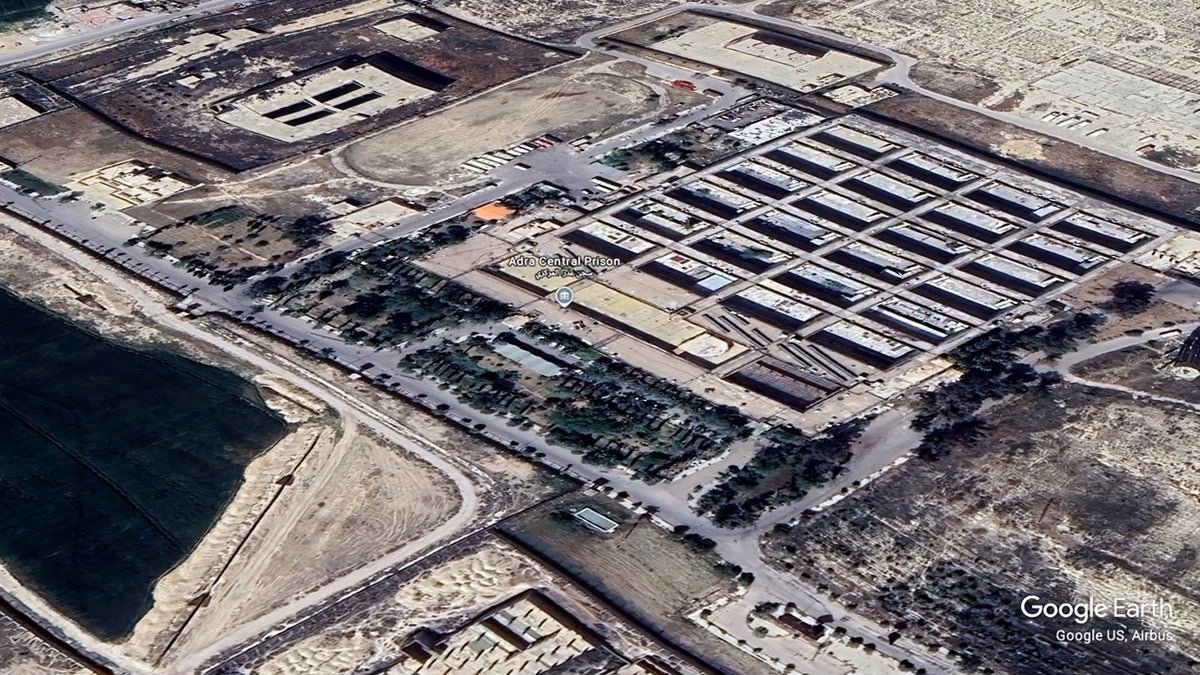 A high-altitude satellite view of Adra Central Prison in Damascus, Syria.