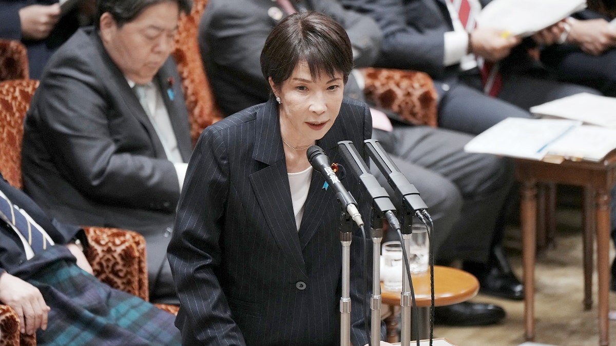Japan’s Prime Minister Sanae Takaichi speaks while responding to questions during a parliamentary budget session in Tokyo.