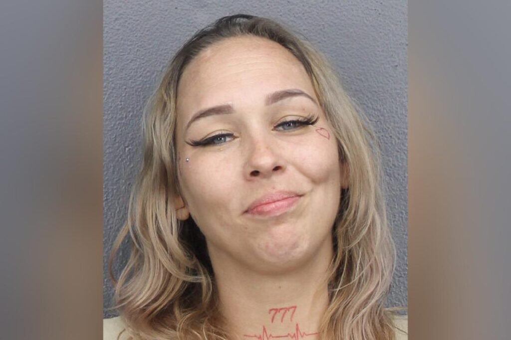 Florida mom with face tattoo grins in mugshot after allegedly trying to murder sister