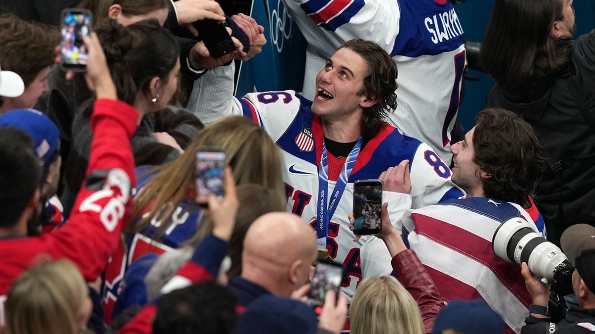 Jack Hughes celebrates