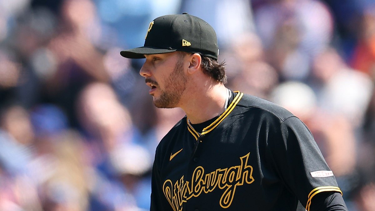 Paul Skenes looks on field