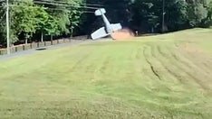 SEE IT: Small plane flips over in South Carolina backyard after pilot's deliberate maneuver