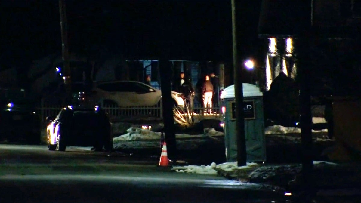 Police at the scene of Danvers residence where 68-year-old woman killed