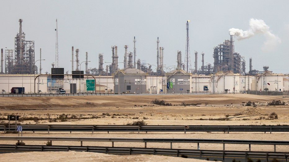 Industrial gas processing facilities and storage infrastructure at a major Qatari energy complex.