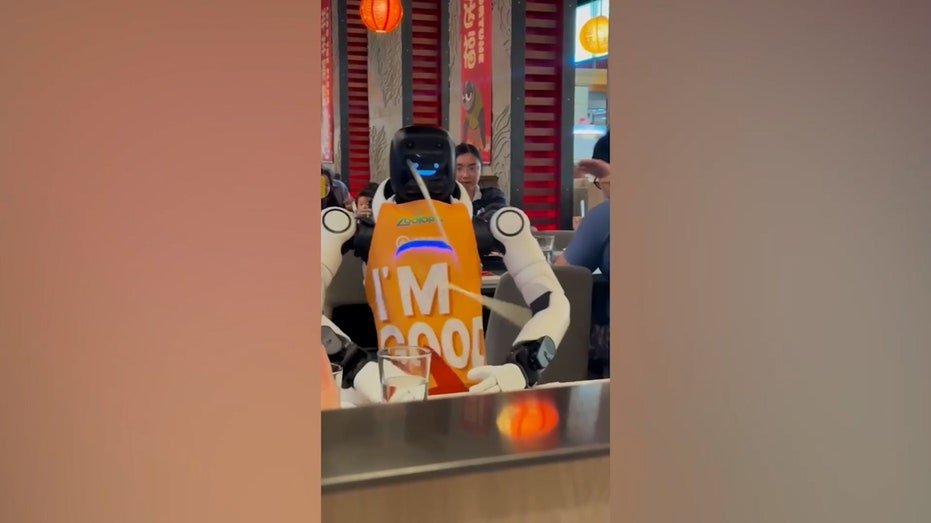 a robot slams table, sending chopsticks flying