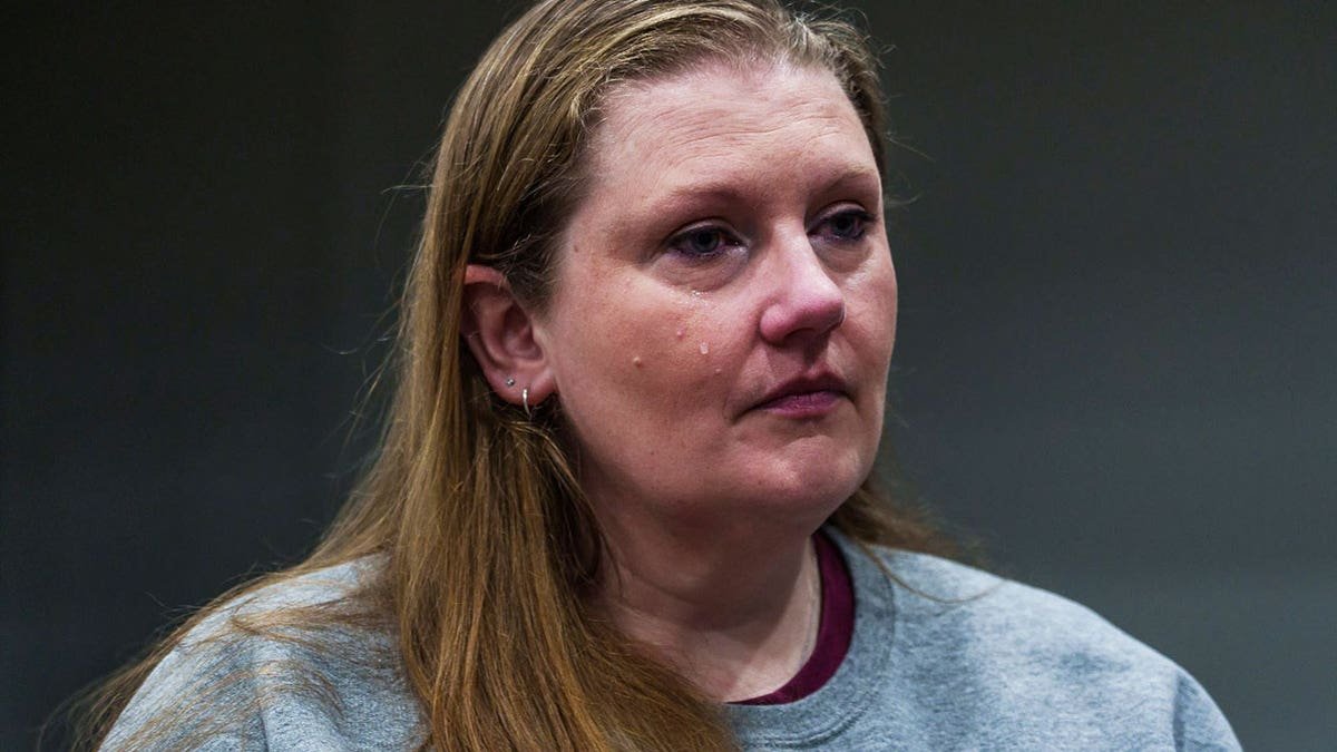 A close-up of Sarah Pender crying.