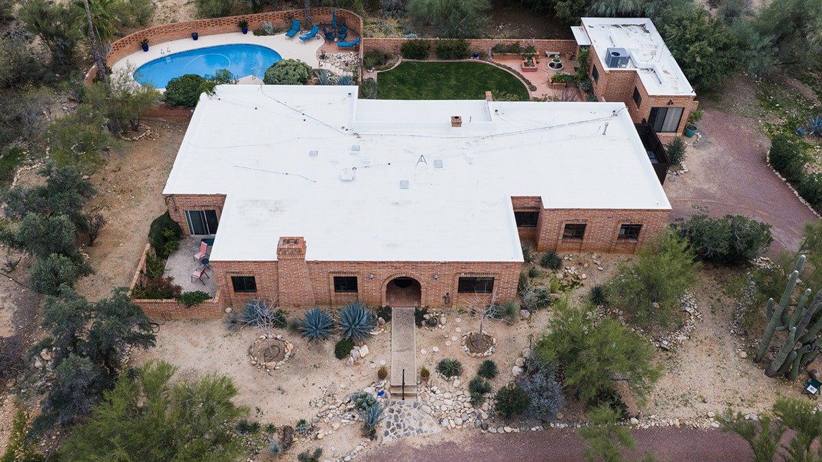 Nancy Guthrie's home and surrounding property viewed from an aerial perspective.