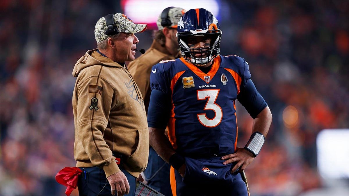 Russell Wilson and Sean Payton speak on field