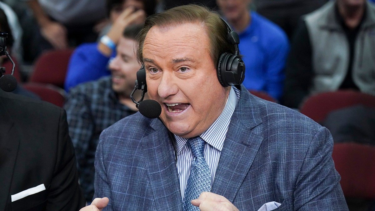 Tim Brando speaks into headset