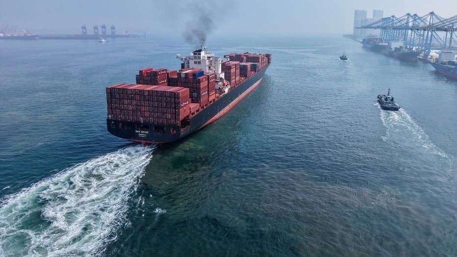 A container ship leaves a Chinese port.