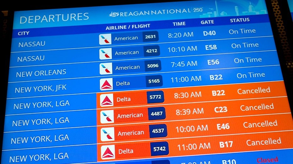 The departure board at Ronald Reagan Washington National Airport