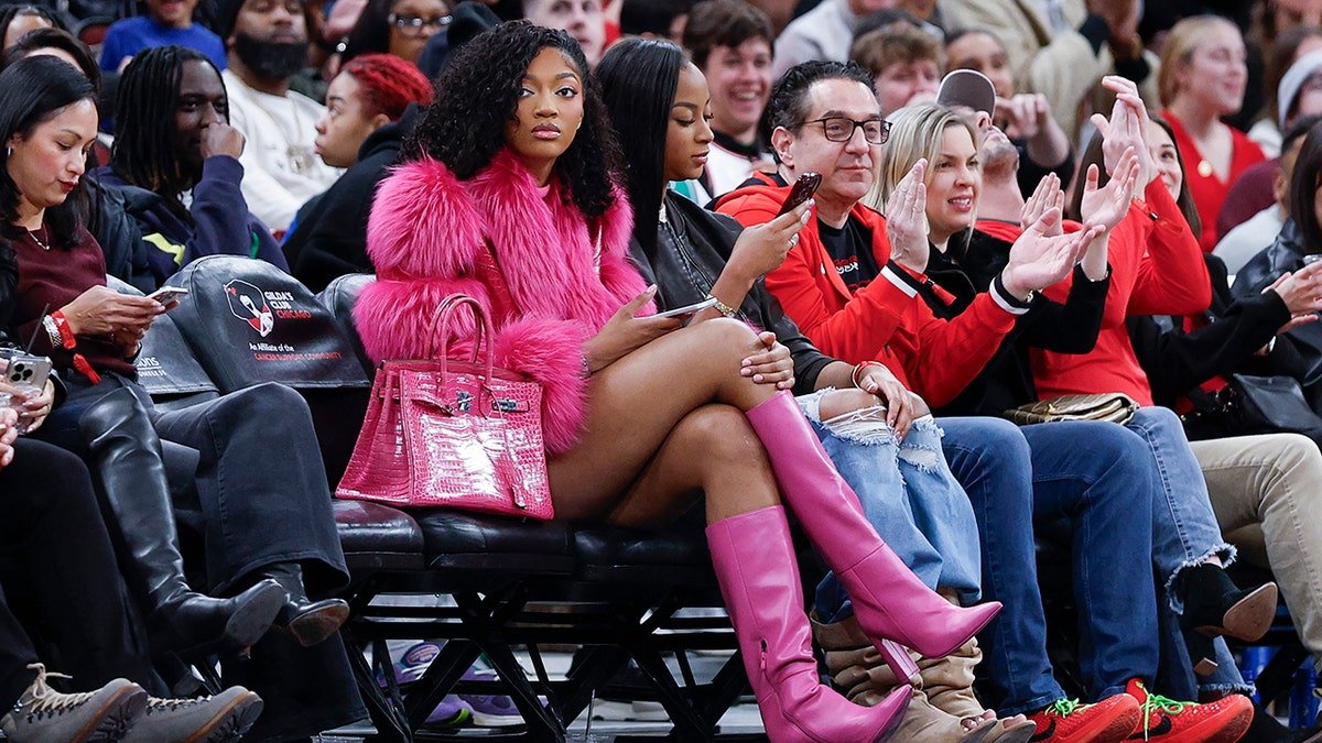 Angel Reese sits courtside at the United Center