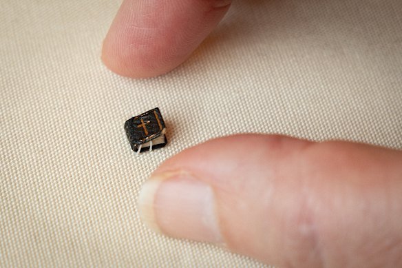The library’s smallest book contains the Lord’s Prayer in many languages.