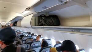Flight passengers slam airlines for pushing early bag checks even with empty bins on board Flight passengers slam airlines for pushing early bag checks even with empty bins on board