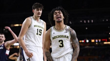 Michigan holds off UConn to capture first men’s basketball national title since 1989 Michigan holds off UConn to capture first men’s basketball national title since 1989