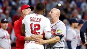 Falcons invite Braves manager to ‘put on the pads’ after his standout tackle during the team’s brawl
