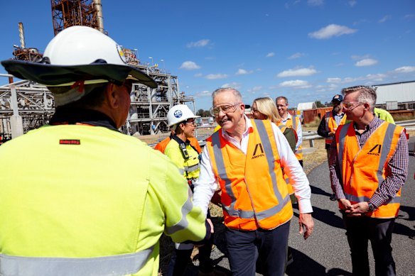 Prime Minister Anthony Albanese greeting a Queensland oil refinery worker on Thursday morning.