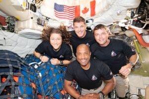 NASA astronauts prepare for splashdown return to earth from moon mission