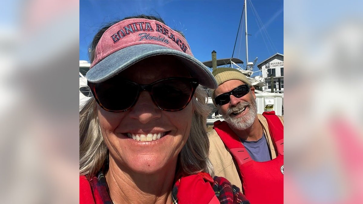 Lynette Hooker standing on a boat near Elbow Cay in the Bahamas