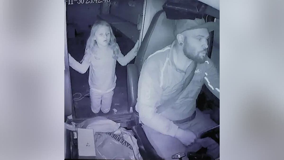 Athena Strand in FedEx truck with Tanner Horner