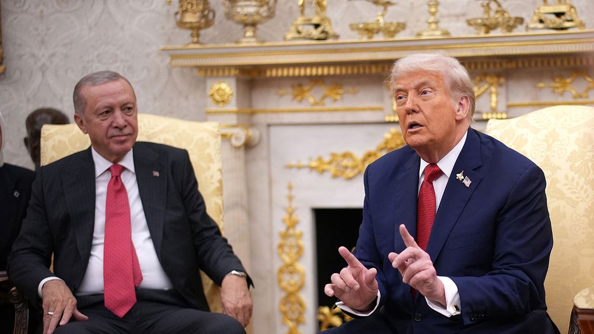 U.S. President Donald Trump speaking in the Oval Office with Turkish President Recep Tayyip Erdogan