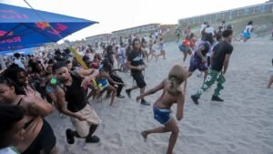 Police flood Orange Crush island hot spot, warn of teen takeovers as beach bash madness returns Police flood Orange Crush island hot spot, warn of teen takeovers as beach bash madness returns