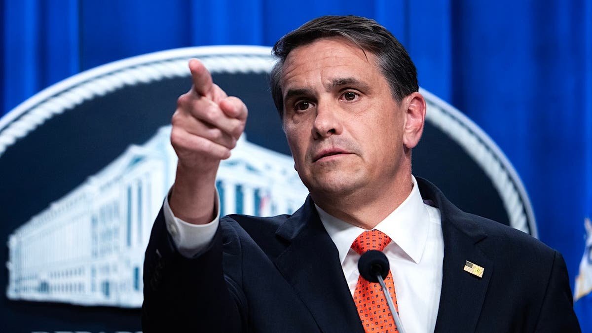 Acting Attorney General Todd Blanche speaking at a news conference at the Department of Justice