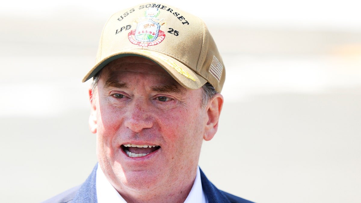 Navy Secretary John Phelan speaking to media on USS Somerset in National City California