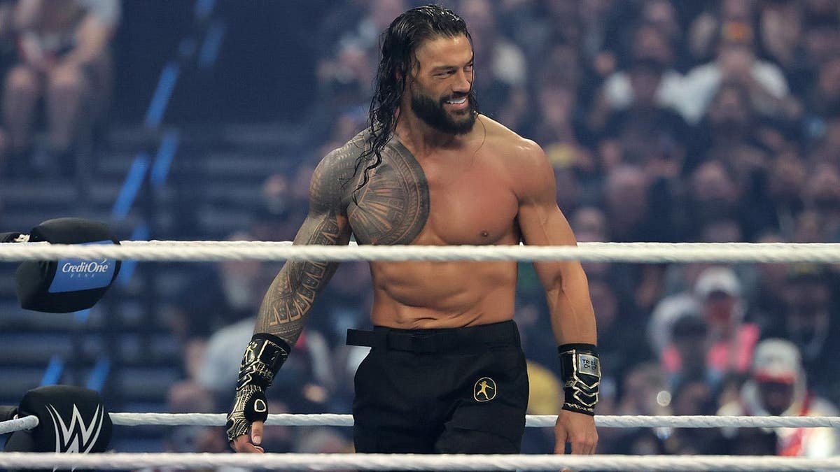 Roman Reigns standing in wrestling ring at Allegiant Stadium