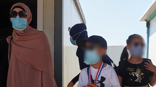 Members of Australian families at Roj Camp in eastern Syria prepare to leave for Damascus as part of a second repatriation effort.