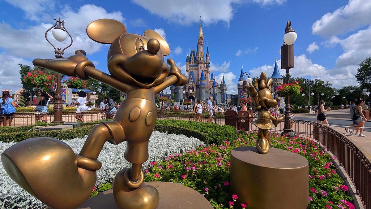 Statues of Mickey Mouse and Minnie Mouse at Magic Kingdom in Orlando, Florida