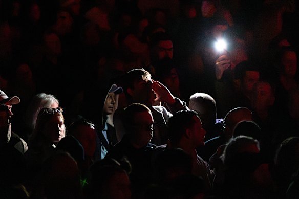 A man boos during the Welcome to Country.