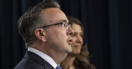 Alberta government meeting with grocers to address food affordability: minister