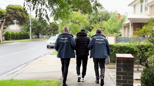 A 28-year-old Newport man being led away by police on Tuesday morning.
