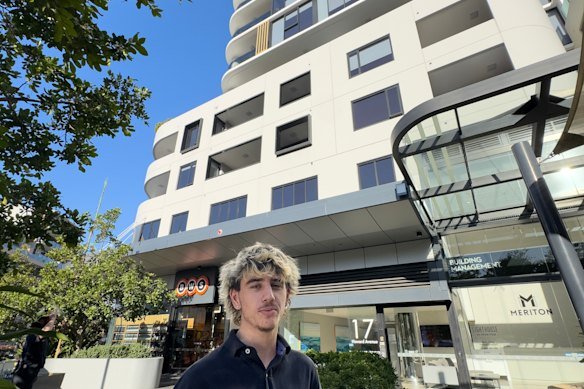Jake Dobrin watched as the family’s Jack Russell, Elbie, was rescued from a ledge outside their apartment in Dee Why.