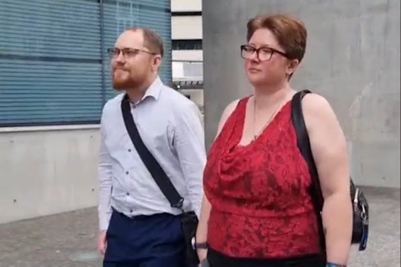 Capps leaving court with a supporter after being found not guilty.