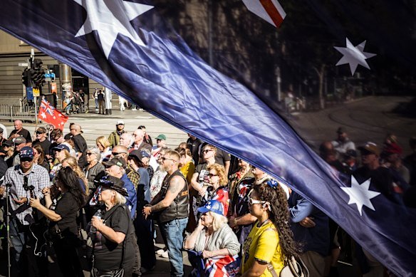 Supporters of Ben Roberts Smith, accused of war crimes during his time during the war in Afghanistan, rally on the steps of Parliament House, Melbourne in a public protest organised by the right-wing group, National Workers Alliance. 