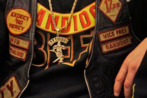 Police allege the extortion plot was directed by patched members of the Bandidos.