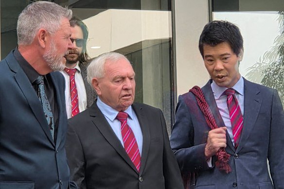 Barry Cable (centre) outside Perth District Court after being acquitted of historical child sex abuse charges.