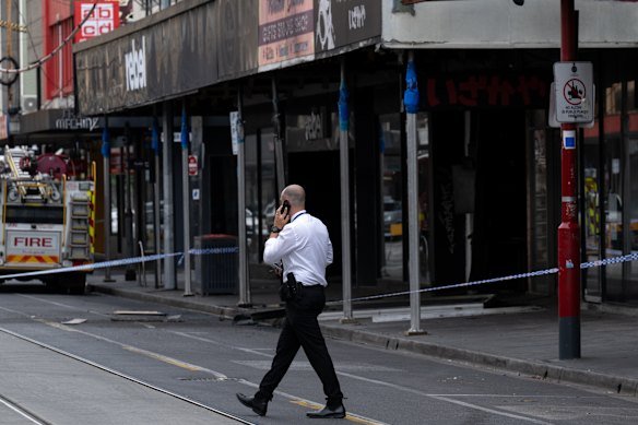 Investigators at the scene of the alleged arson attack in Chapel Street, Prahran, in January 2025.