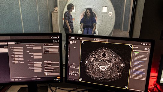 Radiographer Miranda Northey preares Stacey Walker for an MRI at the Forensic Institute of Forensic Medicine: Coroners Courts. 