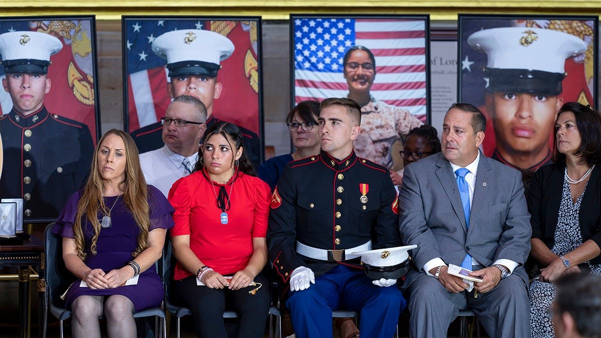 Families of American service members listening to Congressional leaders at the Capitol in Washington