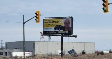 Police put up billboard outside Ontario town in bid to crack homicide cold case