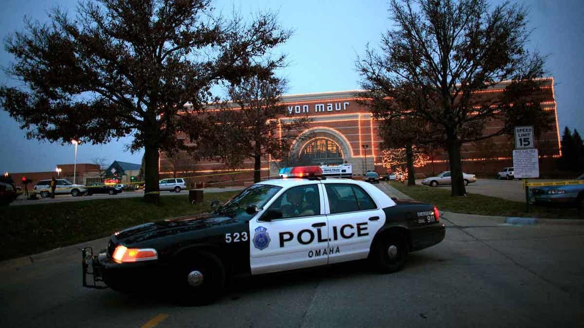 A police car parked in front of the Von Maur store at Westroads Mall in Omaha