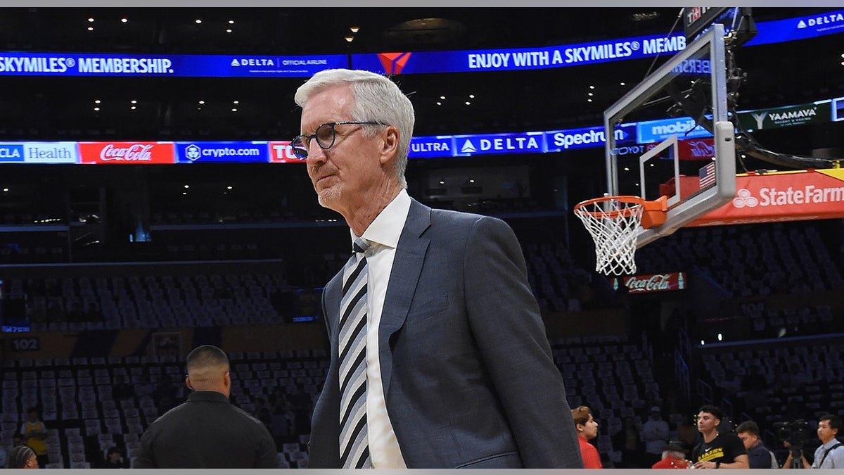 Mike Breen walking on court at Crypto.com Arena in Los Angeles