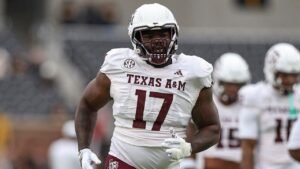 Albert Regis’ baby daughter crawled toward a Jaguars cup before he was drafted by Jacksonville