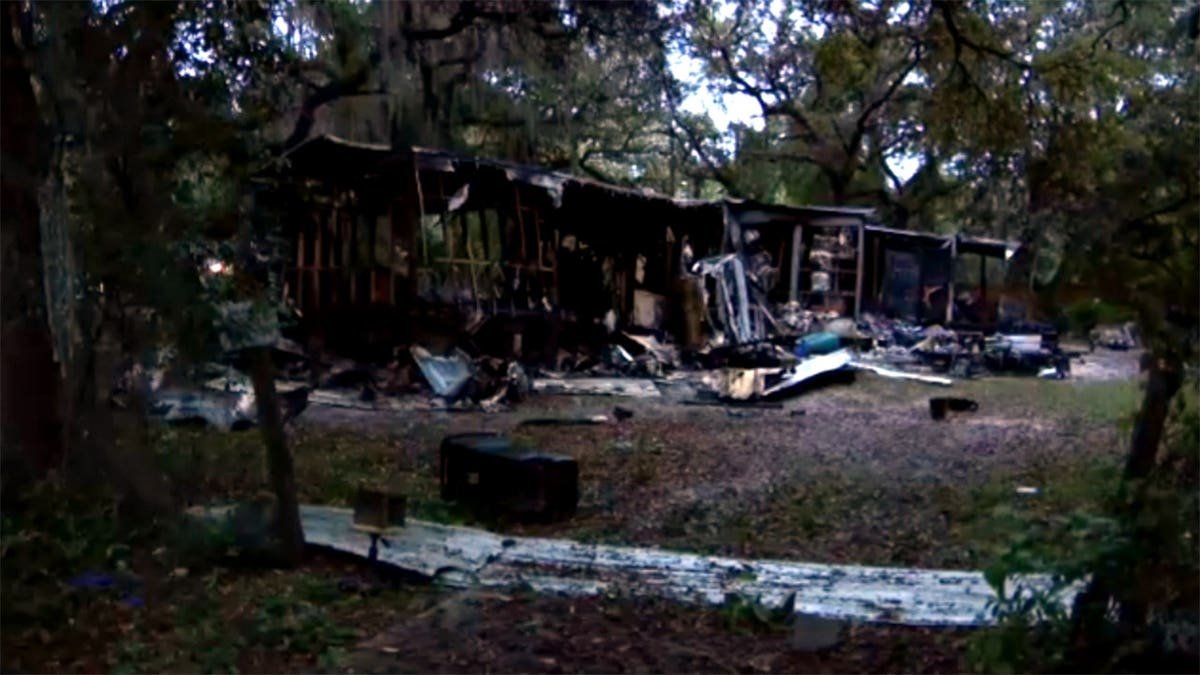 charred Florida home after fire was extinguished